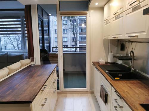 Η κουζίνα ή μικρή κουζίνα στο The Cozy Spot 38 parking gratis