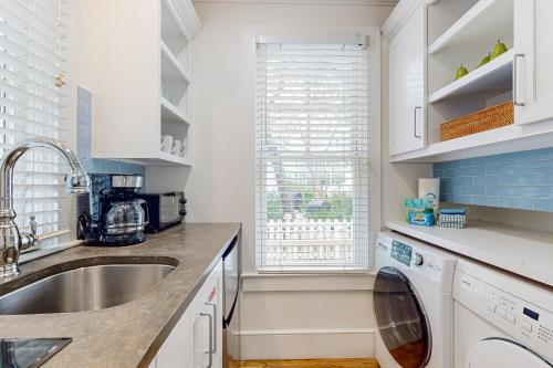 a kitchen with a sink and a dishwasher at Angel in the Dunes in Seagrove Beach