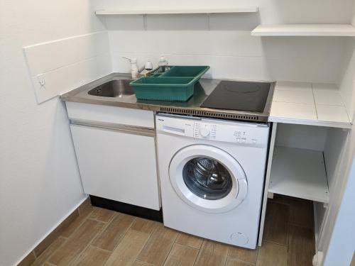 Η κουζίνα ή μικρή κουζίνα στο Bel appartement meublé et aménagé