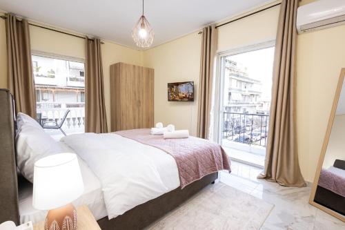 Ένα ή περισσότερα κρεβάτια σε δωμάτιο στο BnB Green Center Trikala
