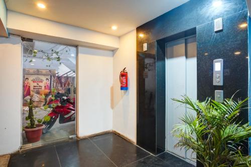 a room with a window with a motorcycle in it at Hotel Aerostar Grand at Yashobhoomi Convention Center in New Delhi