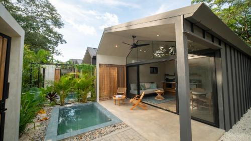 Πισίνα στο ή κοντά στο Selvatico Tamarindo Villas