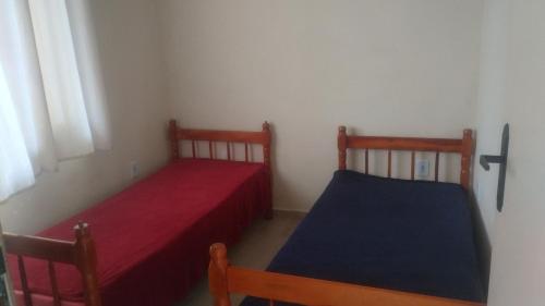 Voodi või voodid majutusasutuse Hospedagem Tia Dete toas