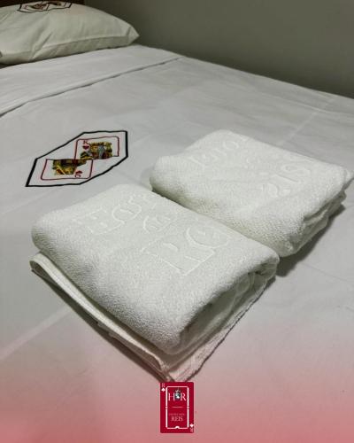 Postel nebo postele na pokoji v ubytování Hotel dos Reis