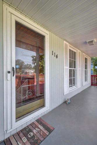 an empty porch with a large glass door on a house at Charleston, near Airport, luxury and cozy house in Ladson