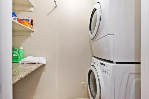 a laundry room with a washer and dryer at Pet Friendly Townhouse in Edwards Community in Edwards