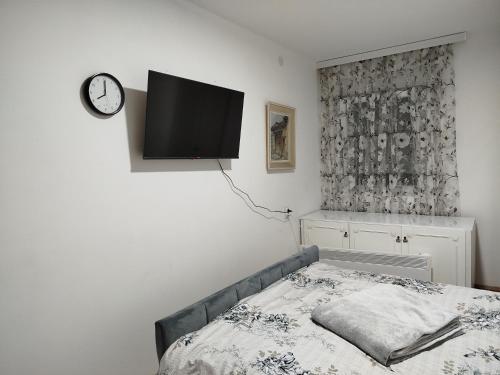 Postel nebo postele na pokoji v ubytování Apartman NINASTA