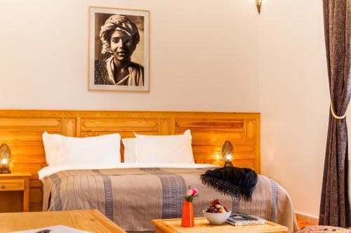 Postel nebo postele na pokoji v ubytování Riad Sougtani