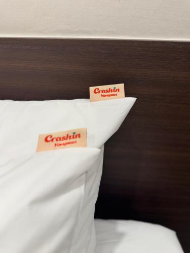 Letto o letti in una camera di CrashinYongsan guest house