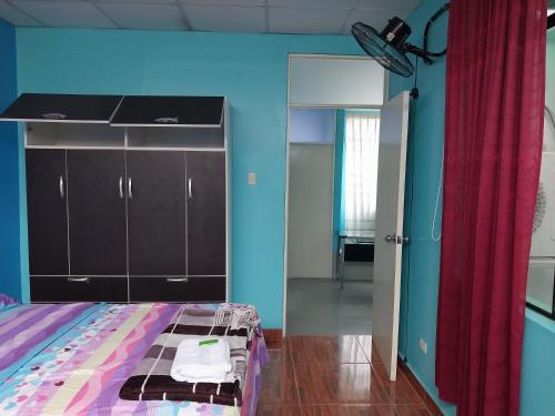 Letto o letti in una camera di Departamento de 4 camas dobles