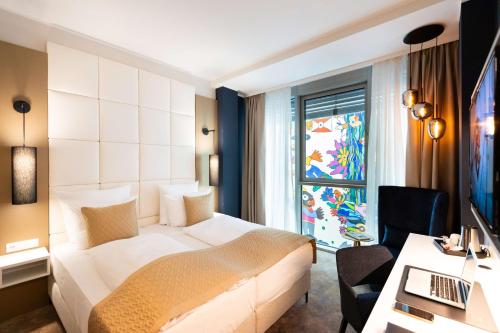Un ou plusieurs lits dans un hébergement de l'établissement Best Western Premier Royal Blue - Adult only