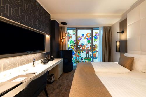 Un ou plusieurs lits dans un hébergement de l'établissement Best Western Premier Royal Blue - Adult only