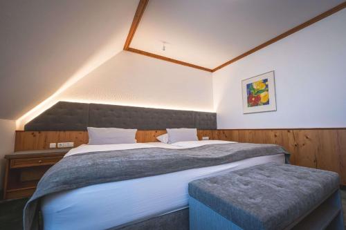 Ένα ή περισσότερα κρεβάτια σε δωμάτιο στο Hotel & Spa Gut Matheshof, BW Signature Collection