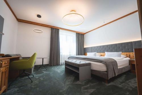 Ένα ή περισσότερα κρεβάτια σε δωμάτιο στο Hotel & Spa Gut Matheshof, BW Signature Collection