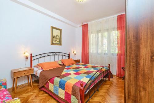 Posteľ alebo postele v izbe v ubytovaní Apartment Giuseppe