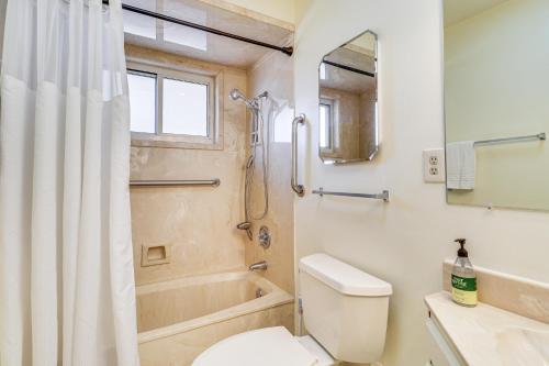 a bathroom with a toilet and a shower at 2 Mi to UNM Campus Home in Quiet Area of ABQ in Albuquerque