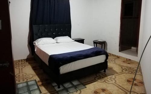 Postel nebo postele na pokoji v ubytování Casa azul