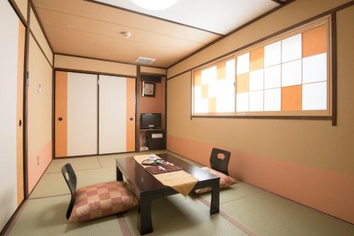 Posezení v ubytování Tenpyo Ryokan