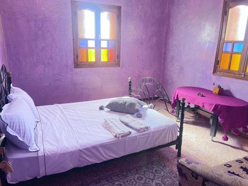 Ein Bett oder Betten in einem Zimmer der Unterkunft Maison Face au lion