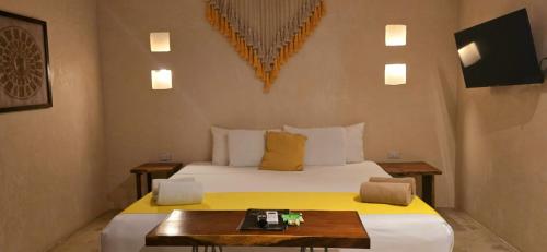 Postel nebo postele na pokoji v ubytování Hotel Kin Tulum Jungle Deluxe