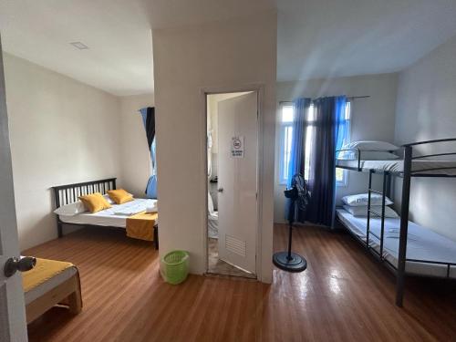 Postel nebo postele na pokoji v ubytování Baden Powell Hostel