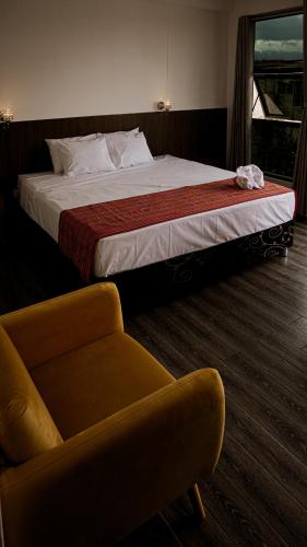 Letto o letti in una camera di Rivo Ohia Inn