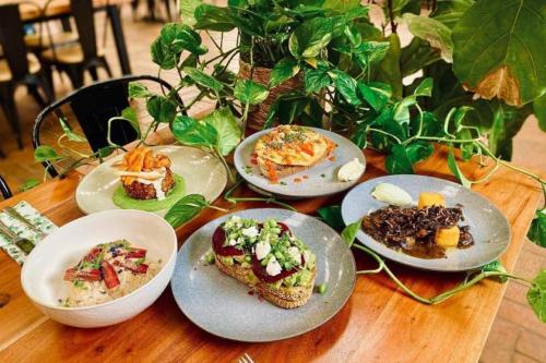 four plates of food on a wooden table at Werribee Blast from the Past in Werribee