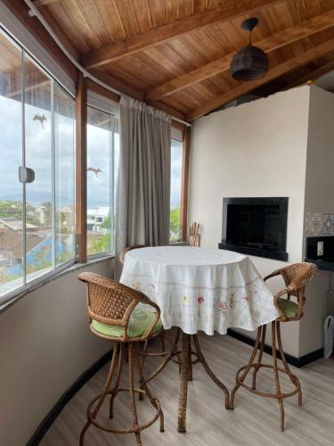 Et tv og/eller underholdning på Cobertura com vista mar