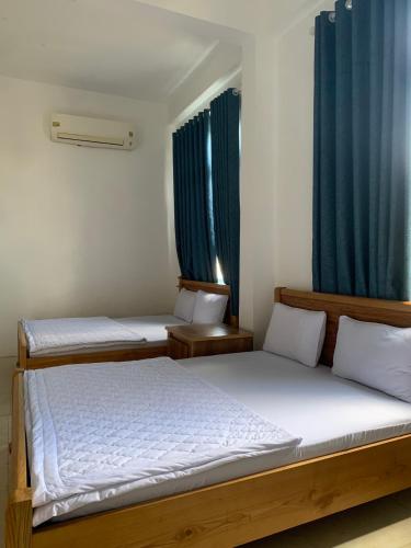 Katil atau katil-katil dalam bilik di Khách sạn Hoàng Điệp 3