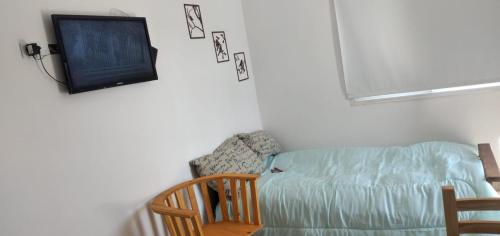 Postel nebo postele na pokoji v ubytování Dpto PA frente al Rio