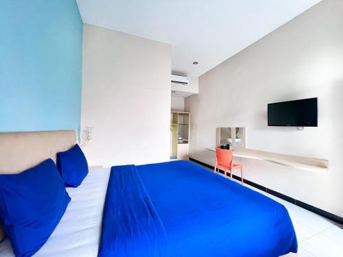 Кровать или кровати в номере Ceria Boutique Hotel