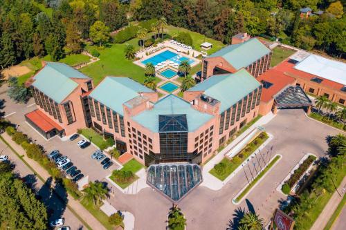 an overhead view of a large building with a pool at Sheraton Pilar Hotel & Convention Center in Pilar