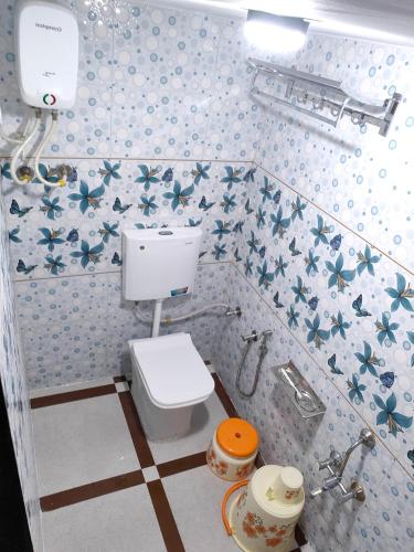Koupelna v ubytování Krishna Homestay