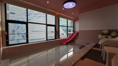 Posezení v ubytování Almond Kids Poolvilla Nampo