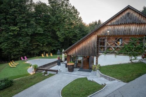 an image of a house with a garden at Luxury Chalet Martin in Grosuplje