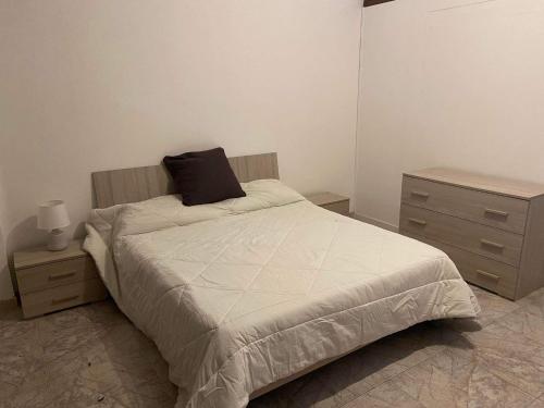 Ένα ή περισσότερα κρεβάτια σε δωμάτιο στο Appartamento TICHE