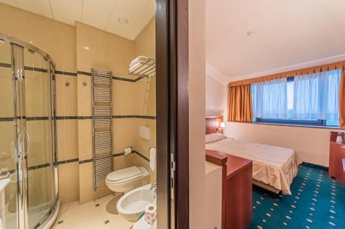 Koupelna v ubytování Dado Hotel International