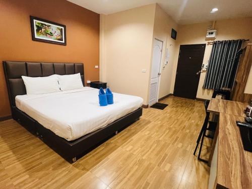 Una cama o camas en una habitación de ช้างเผือกเกสต์เฮ้าส์ Changphueak Guesthouse