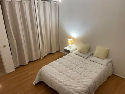 Postel nebo postele na pokoji v ubytování Grand T2 centre Villard-de-Lans