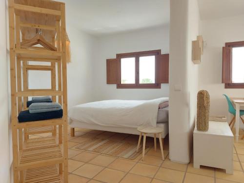 Ένα ή περισσότερα κρεβάτια σε δωμάτιο στο Casa A.Mar