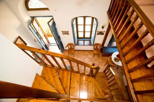 an overhead view of a wooden staircase in a house at Kantouni Bay Suites in Kalymnos