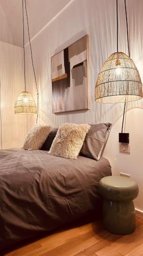 Una cama o camas en una habitación de Suite Eleven