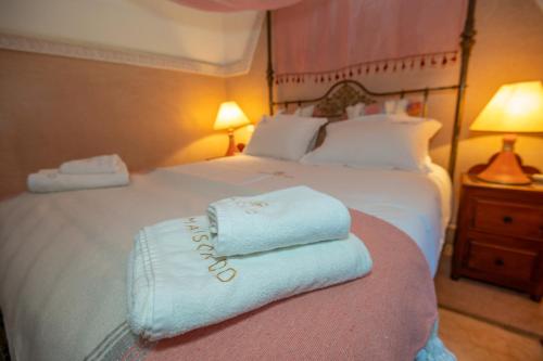 Cama o camas de una habitación en Maison Do