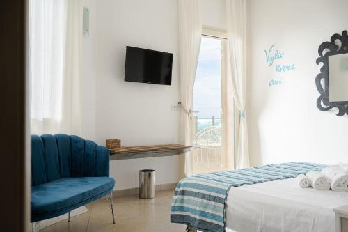Preferisco b&b e trattoria sul mareにあるベッド