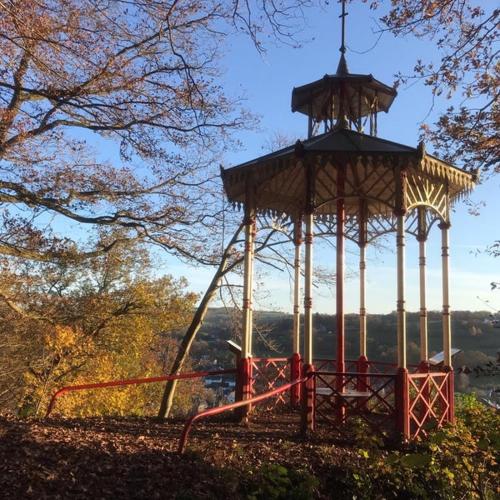 a gazebo in a park with people in it at 4 seasons house in Malmedy