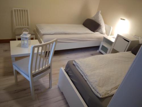 Postel nebo postele na pokoji v ubytování Monteurzimmer Lützow