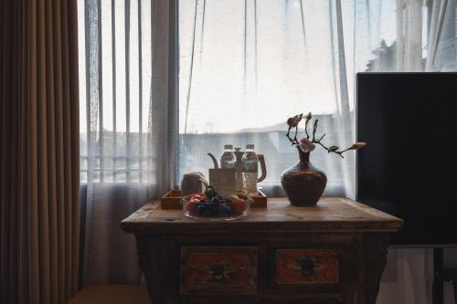 Fotografie z fotogalerie ubytování 丽江见山庐观景花园民宿 v destinaci Li-ťiang