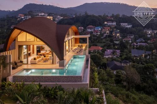 a rendering of a house with a swimming pool at Santi Peak Villas in Amphoe Koh Samui