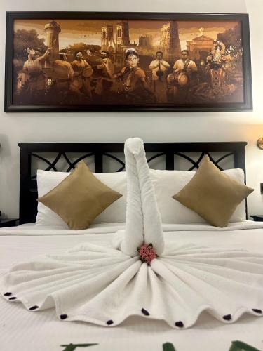Un ou plusieurs lits dans un hébergement de l'établissement Lagoon Sarovar Premiere Resort - Pondicherry