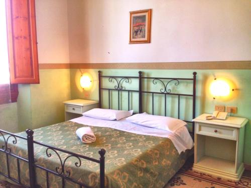 Katil atau katil-katil dalam bilik di Hotel Desirèe